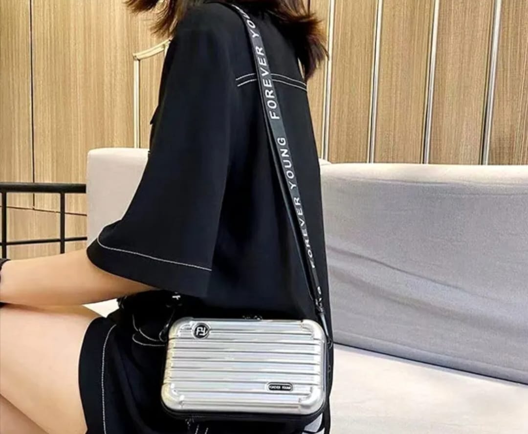 Forever young Briefcase Style Cellphone Crossbody Bag.