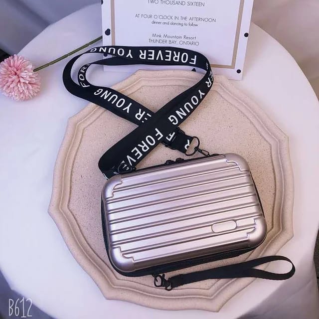 Forever young Briefcase Style Cellphone Crossbody Bag.