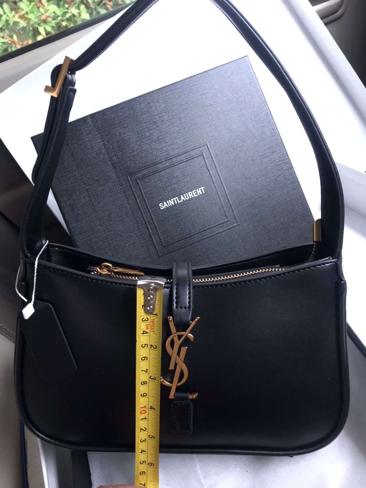 Saint Laurent Le 5 à 7 Hobo Bag.